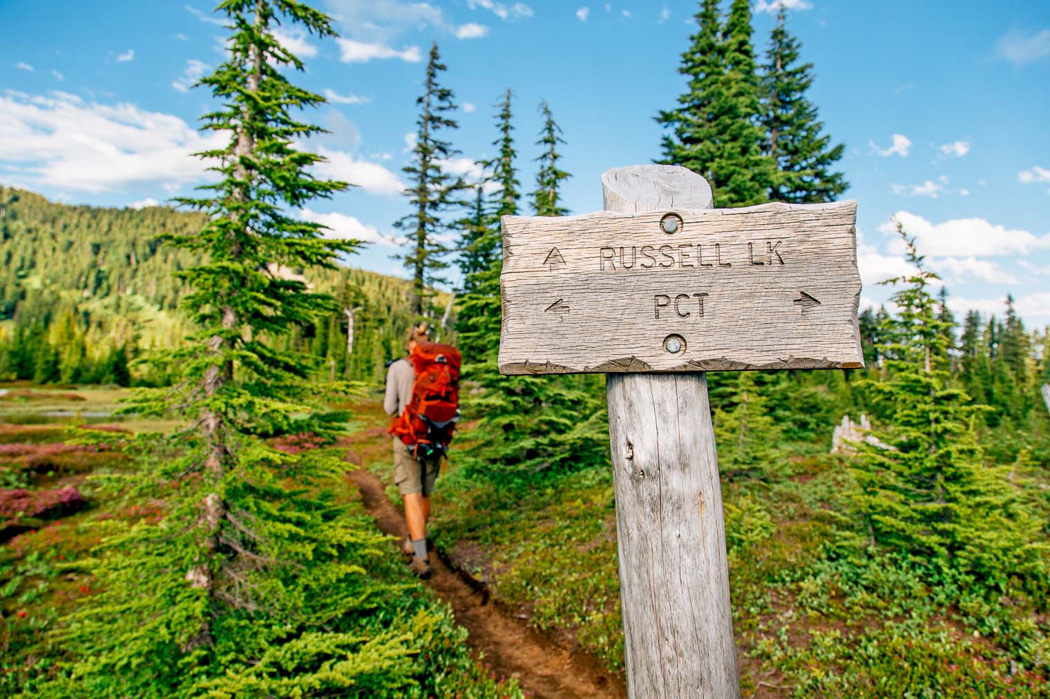 Michael at the junction sign of the PCT and Russell Lake Trail