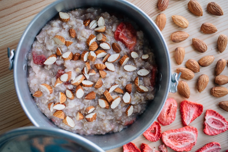 Oatmeal with almonds and freeze dried strawberries in a pot