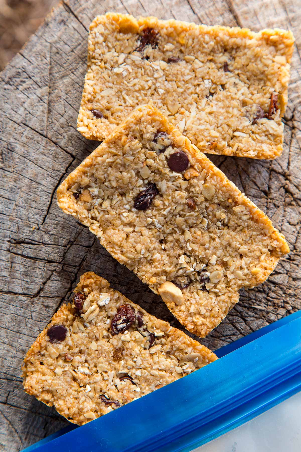 Three granola bars on a stump