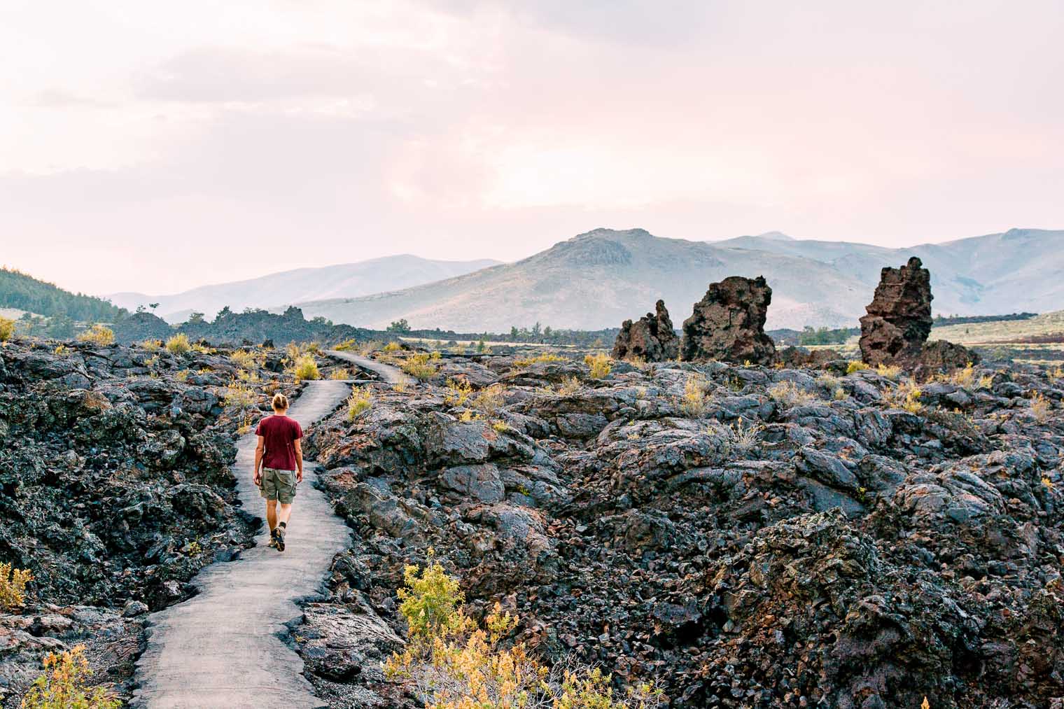 Michael walking on a path through the Craters of the Moon National Monument