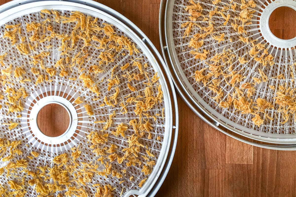 Dehydrated chicken on trays