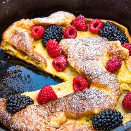 Dutch baby with a slice cut out