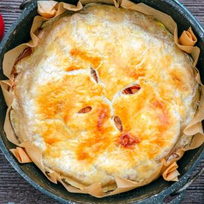 Overhead view of apple pie in a cast iron dutch oven