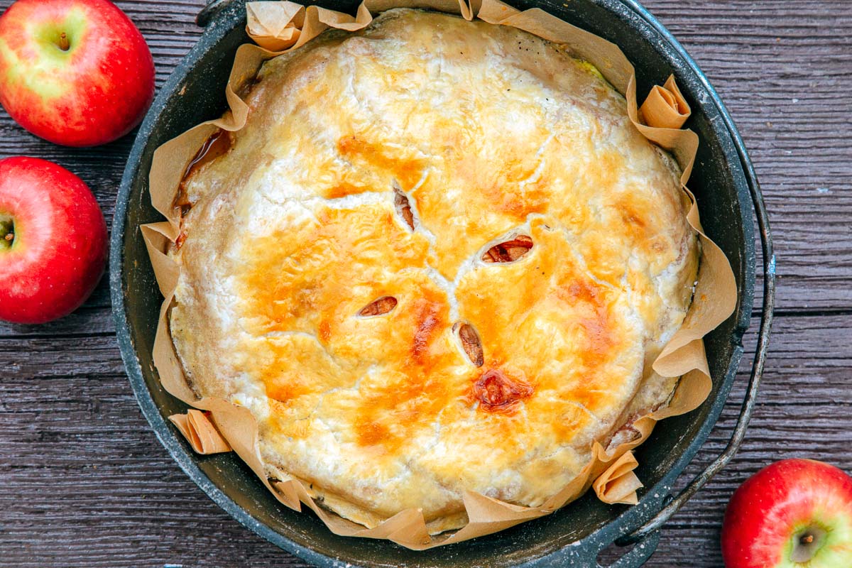 Overhead view of apple pie in a cast iron dutch oven