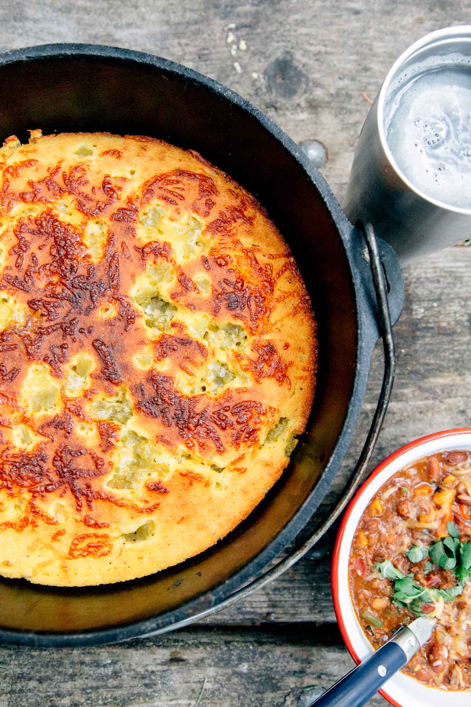 This Dutch Oven Cornbread recipe is perfect for camping trips next to a bowl of chili!