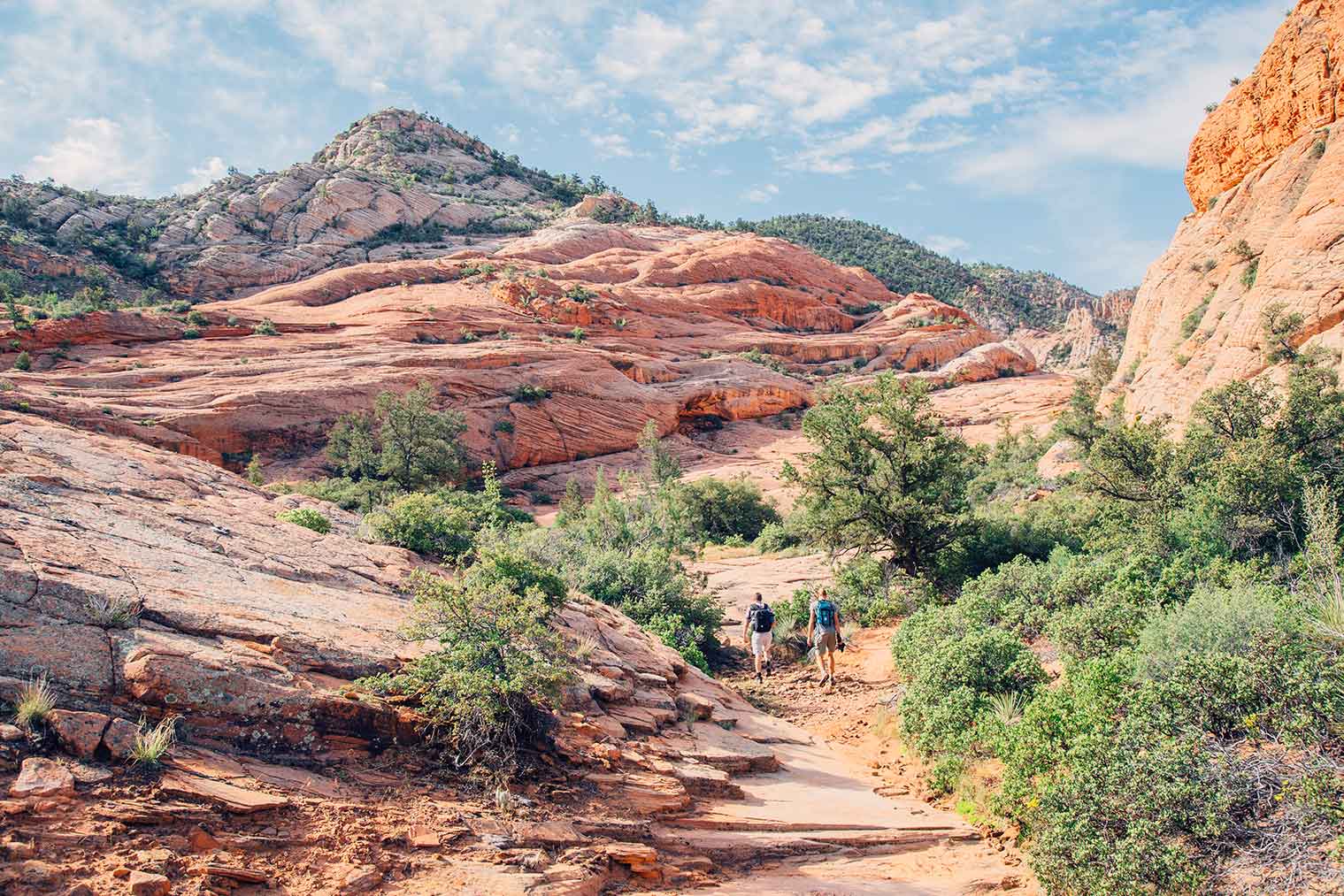 Three people hiking to the vortex