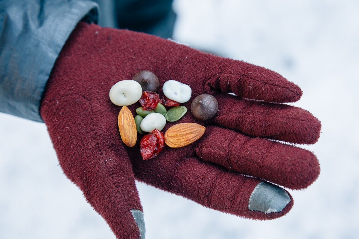 Megan holding a handful of trail mix