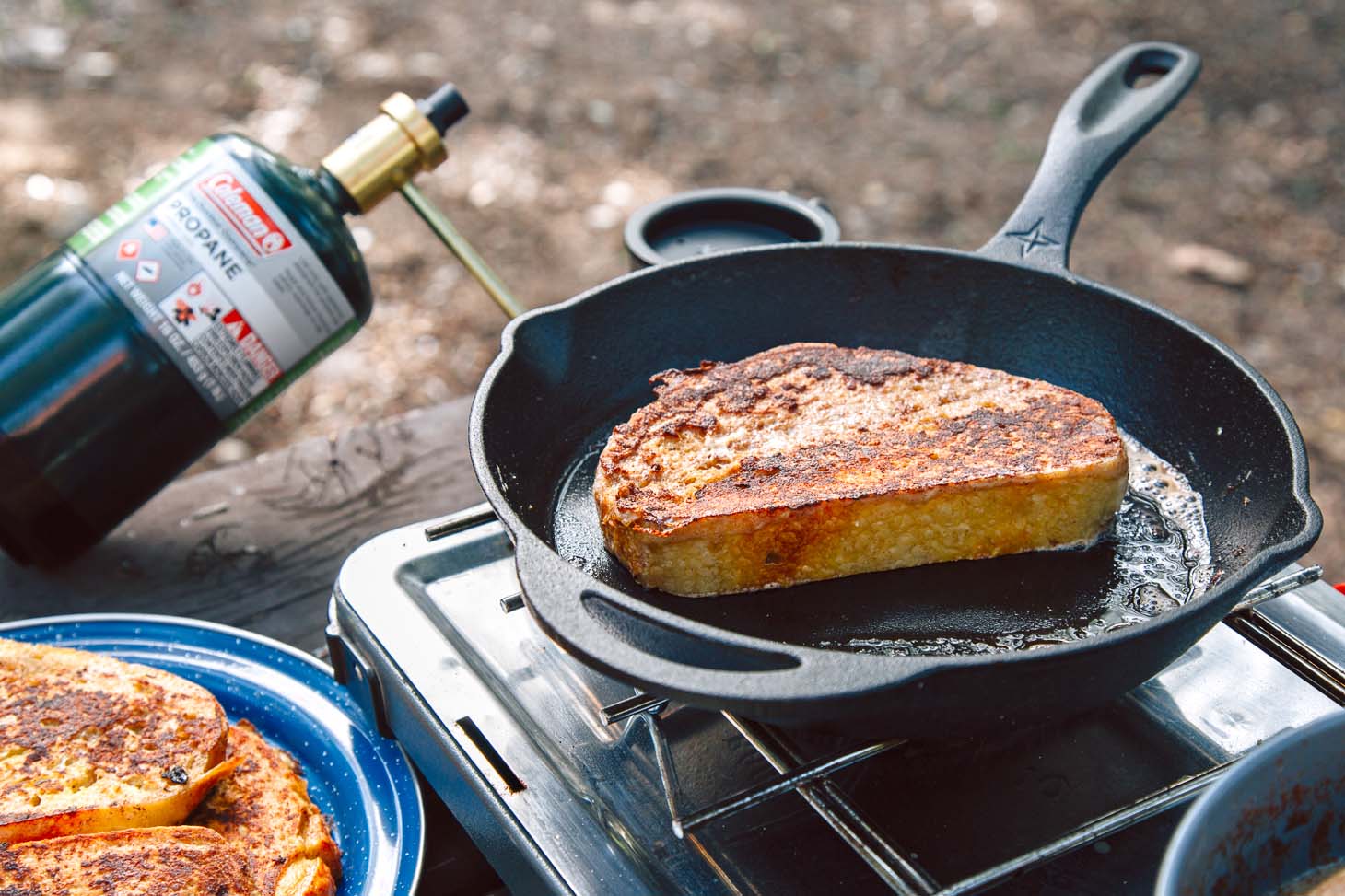 French toast frying in a cast iron skillet