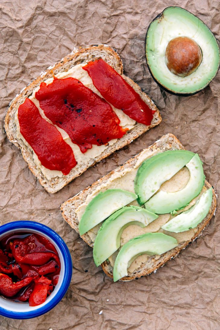 Hummus, avocado, and pepper sandwich