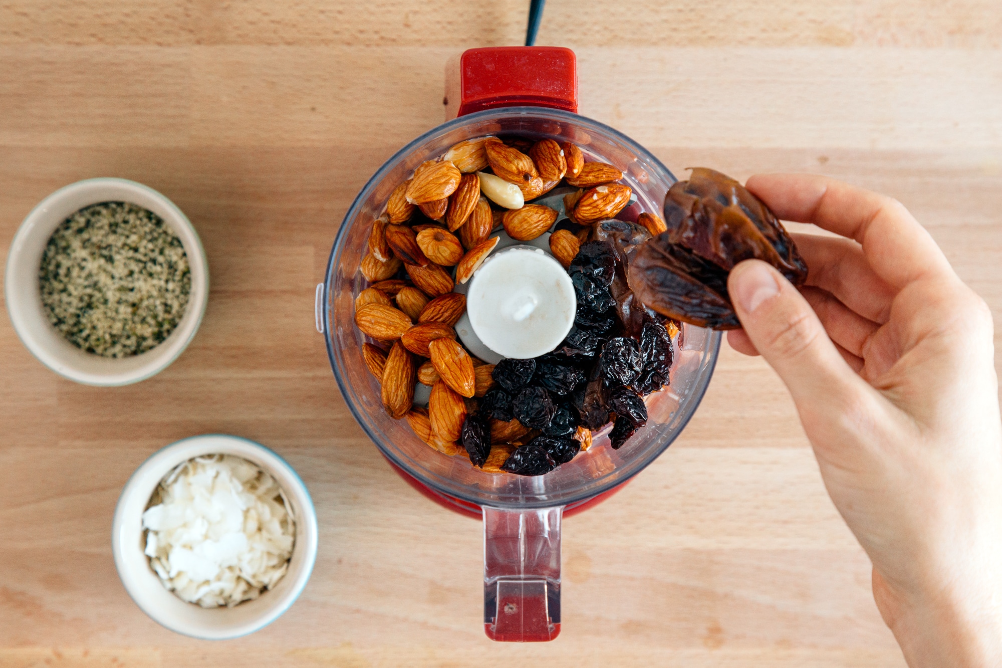 Adding dates into a food processor for energy balls