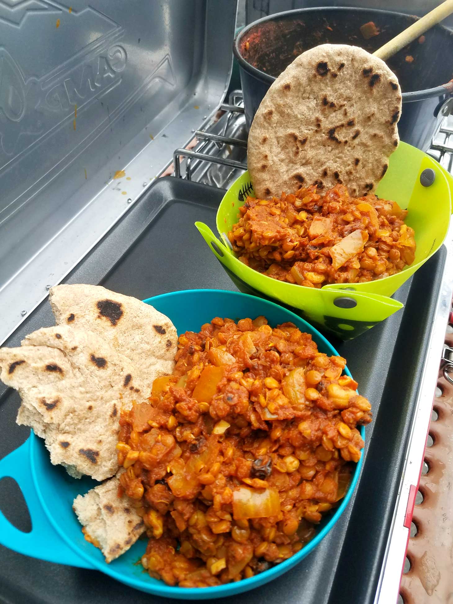 Lentil dhal in a bowl with roti