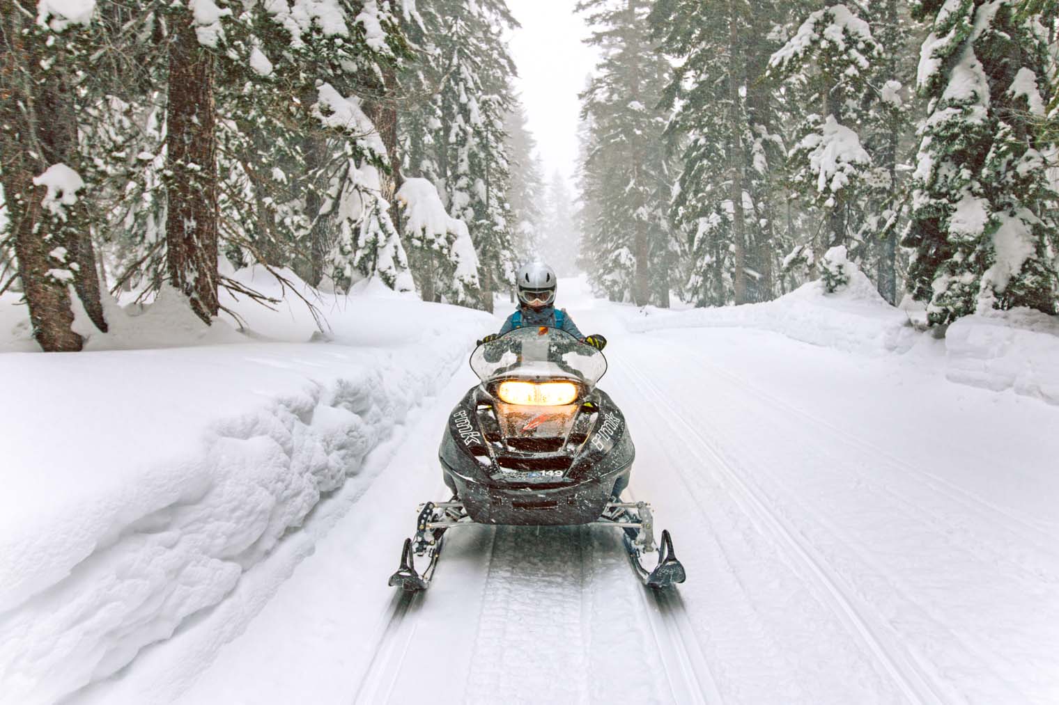 Megan on a snowmobile