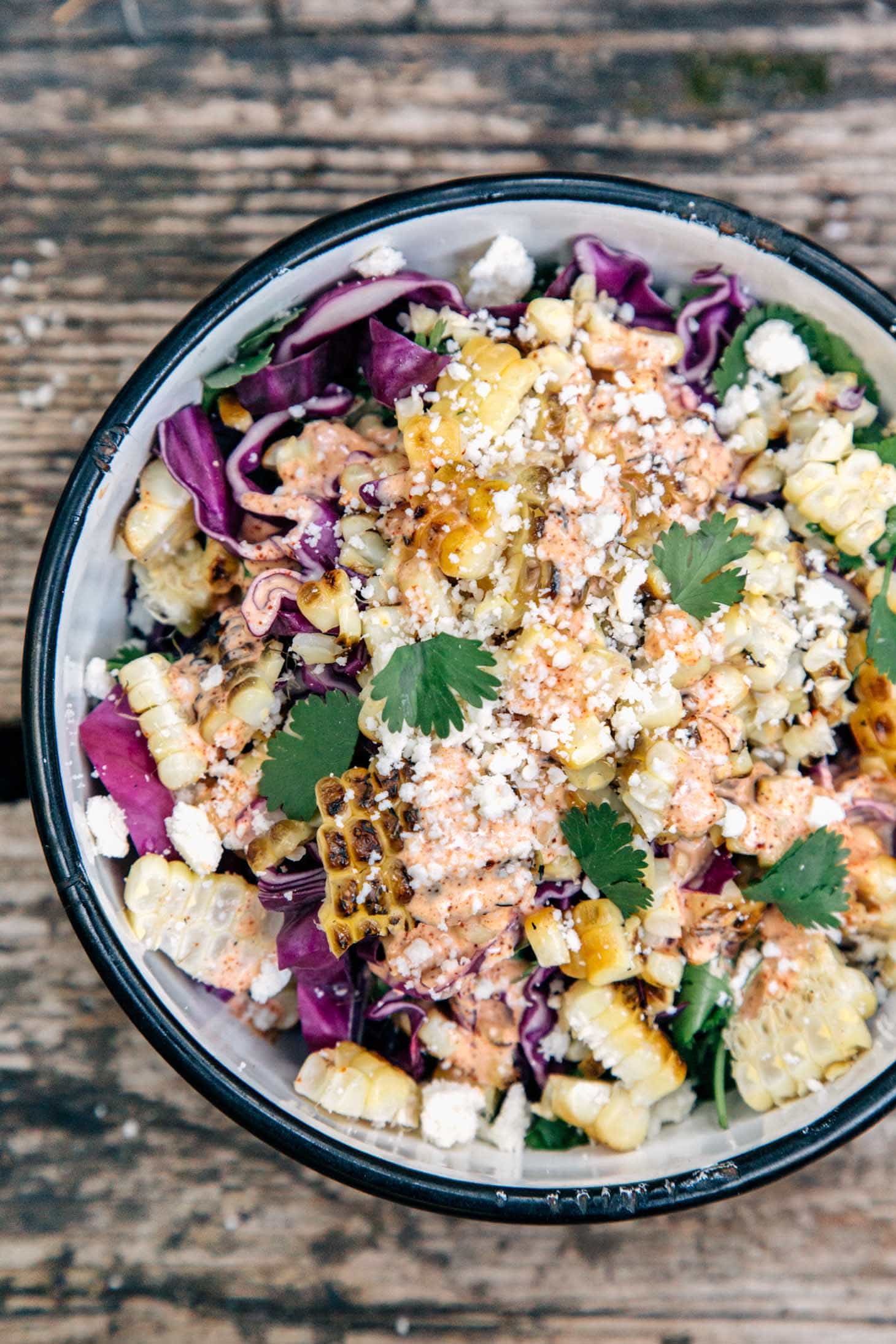 A fun take on Mexican street corn, this grilled esquites recipe (Mexican coleslaw) is a great side to serve with dinner while camping!