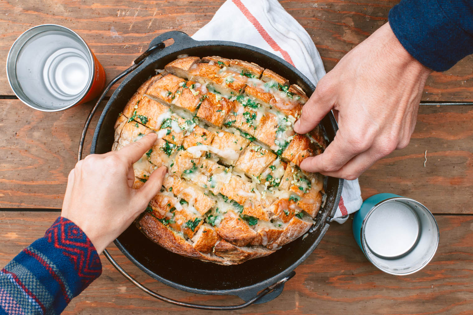 Pull apart bread in a Dutch oven Megan and Michael are reaching into grab a piece