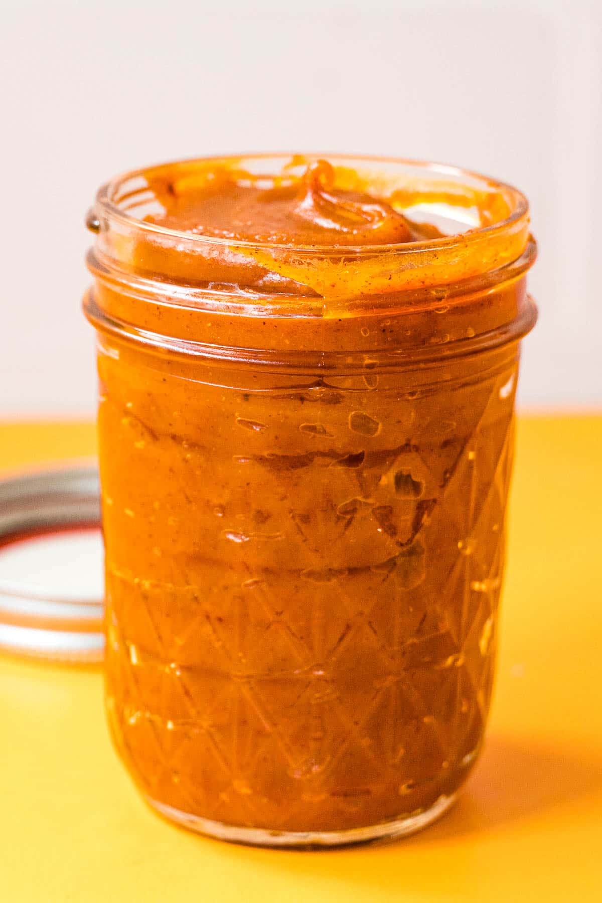 Pumpkin butter in a mason jar.