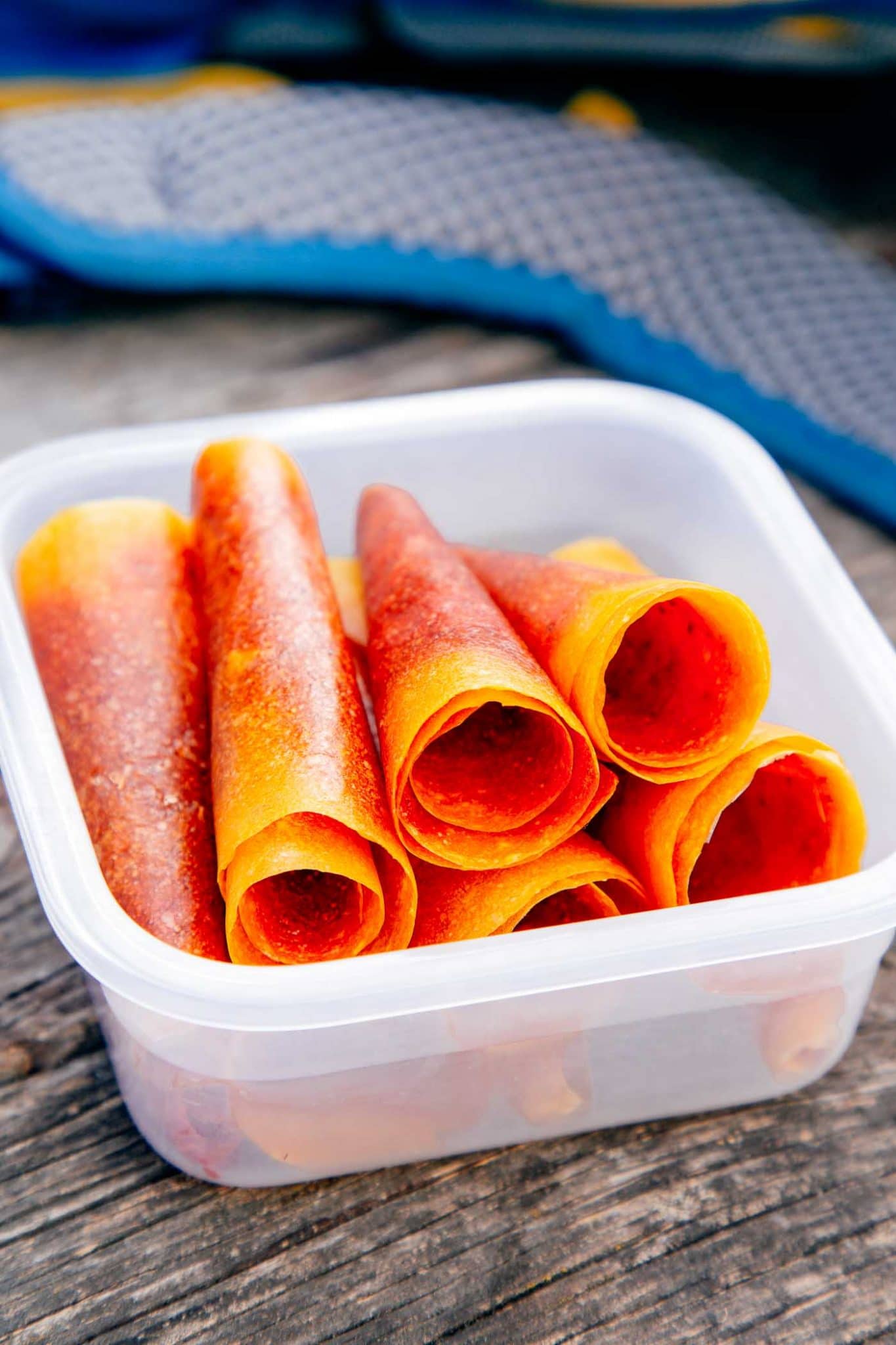 Mango strawberry fruit rolls in a container