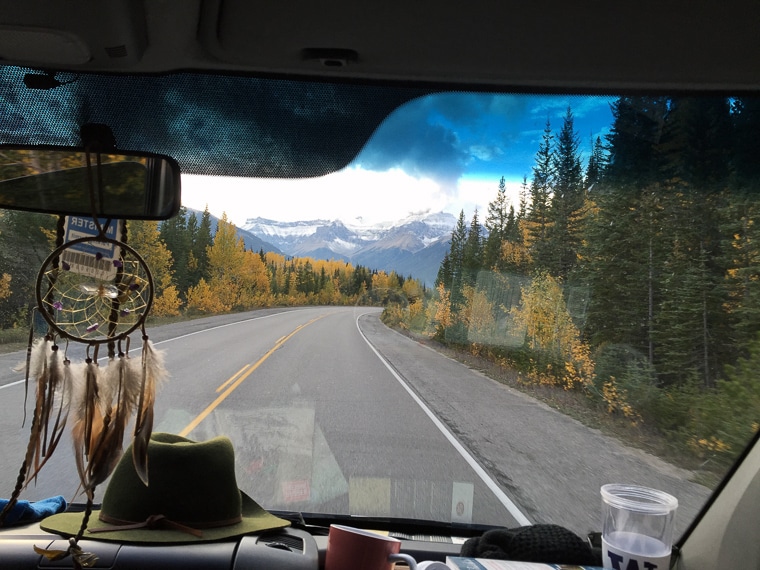 Empty road as seen from the front cab of a camper van