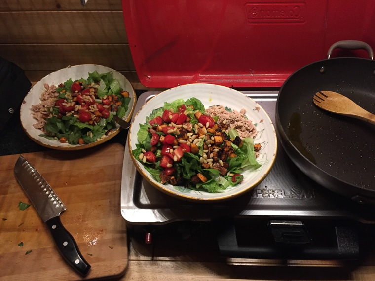 Cooking dinner on a camp stove