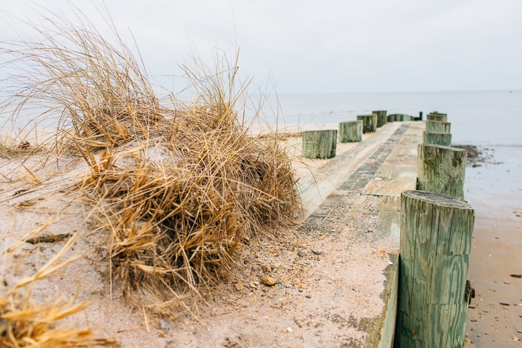 a sandy pier at a beach