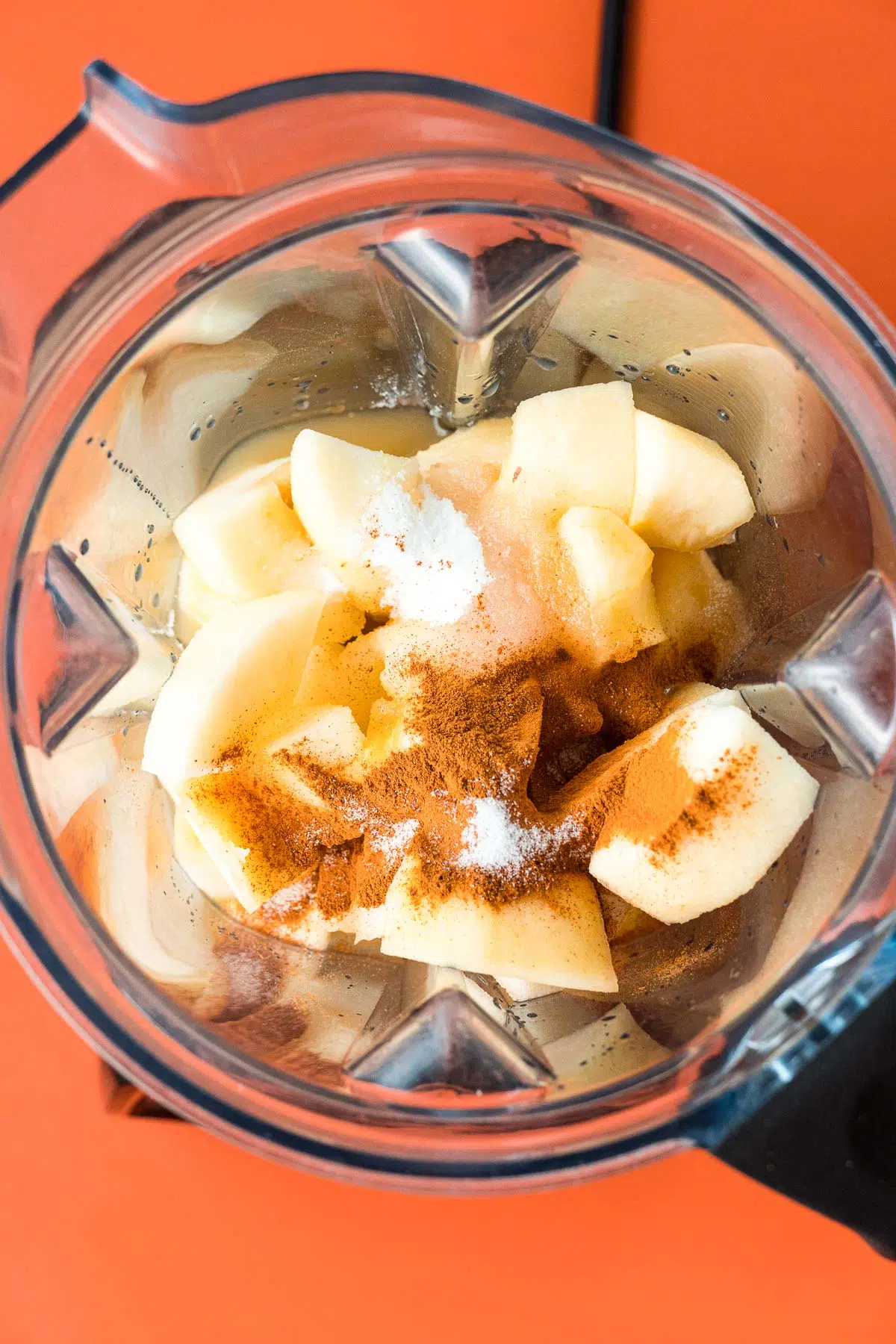 Apple butter ingredients in a blender.