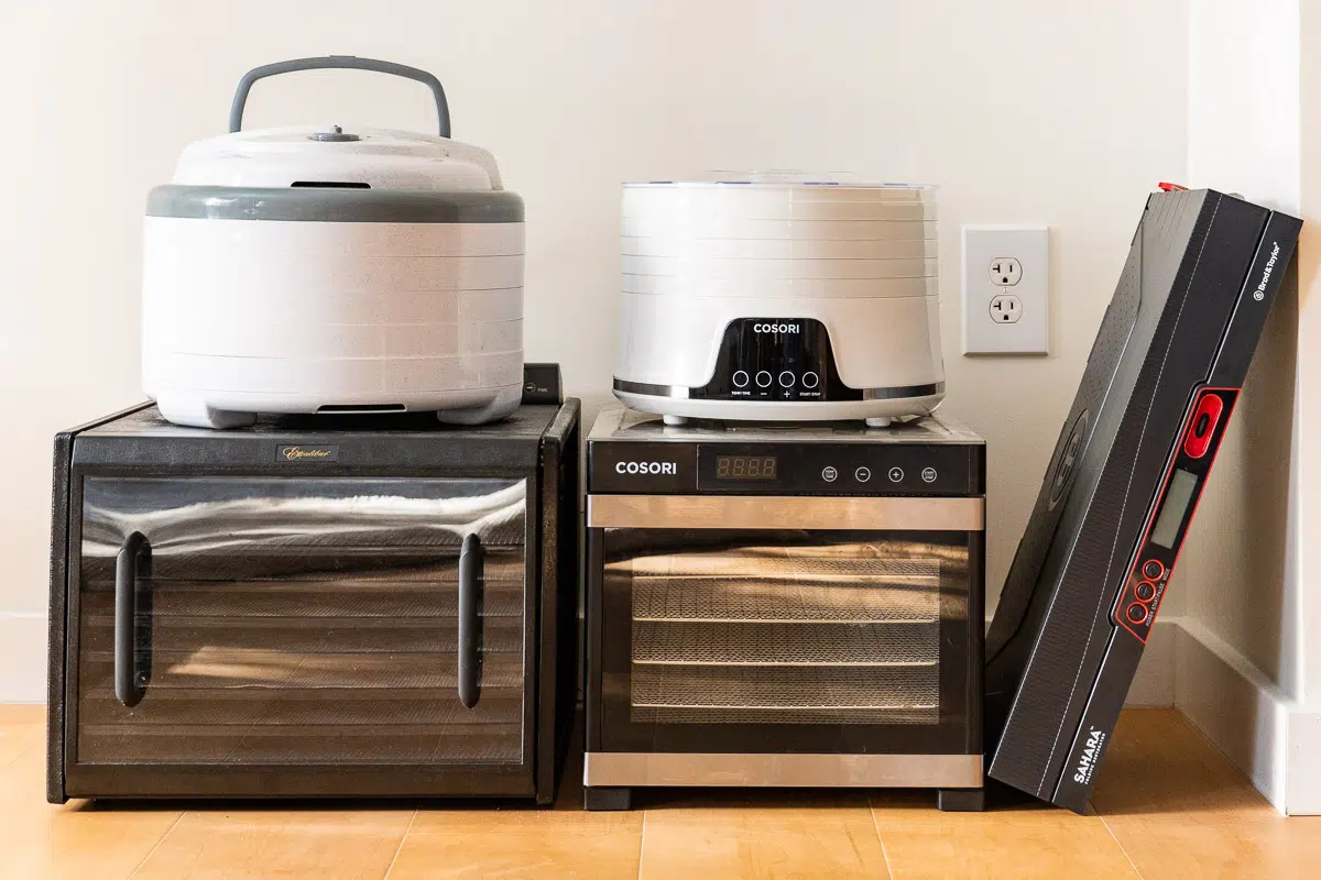 Five dehydrators arranged to show varying sizes