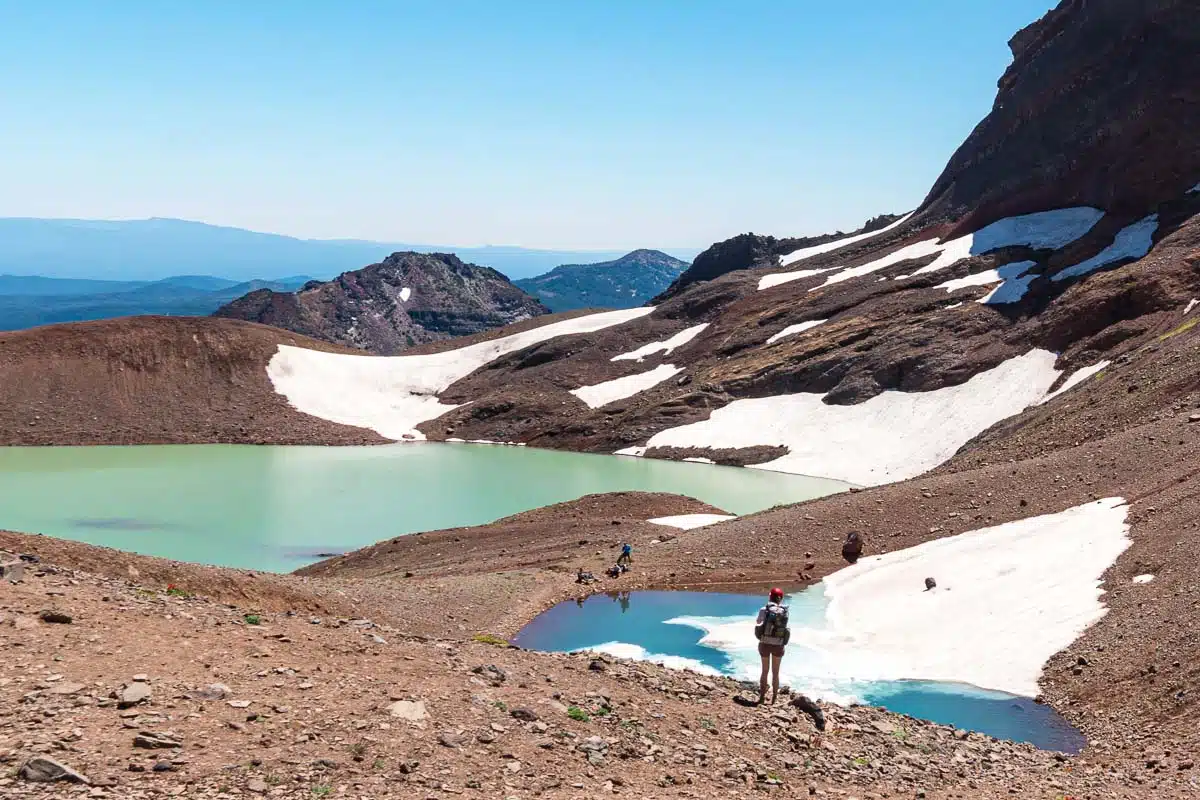 Megan standing on an overlook looking down towards No Name Lake