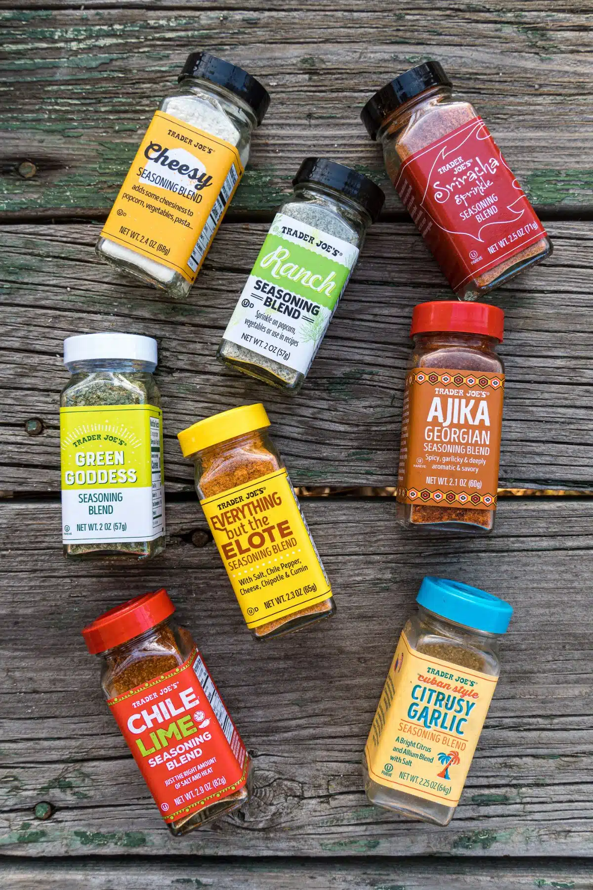 A variety of seasoning blends in jars.