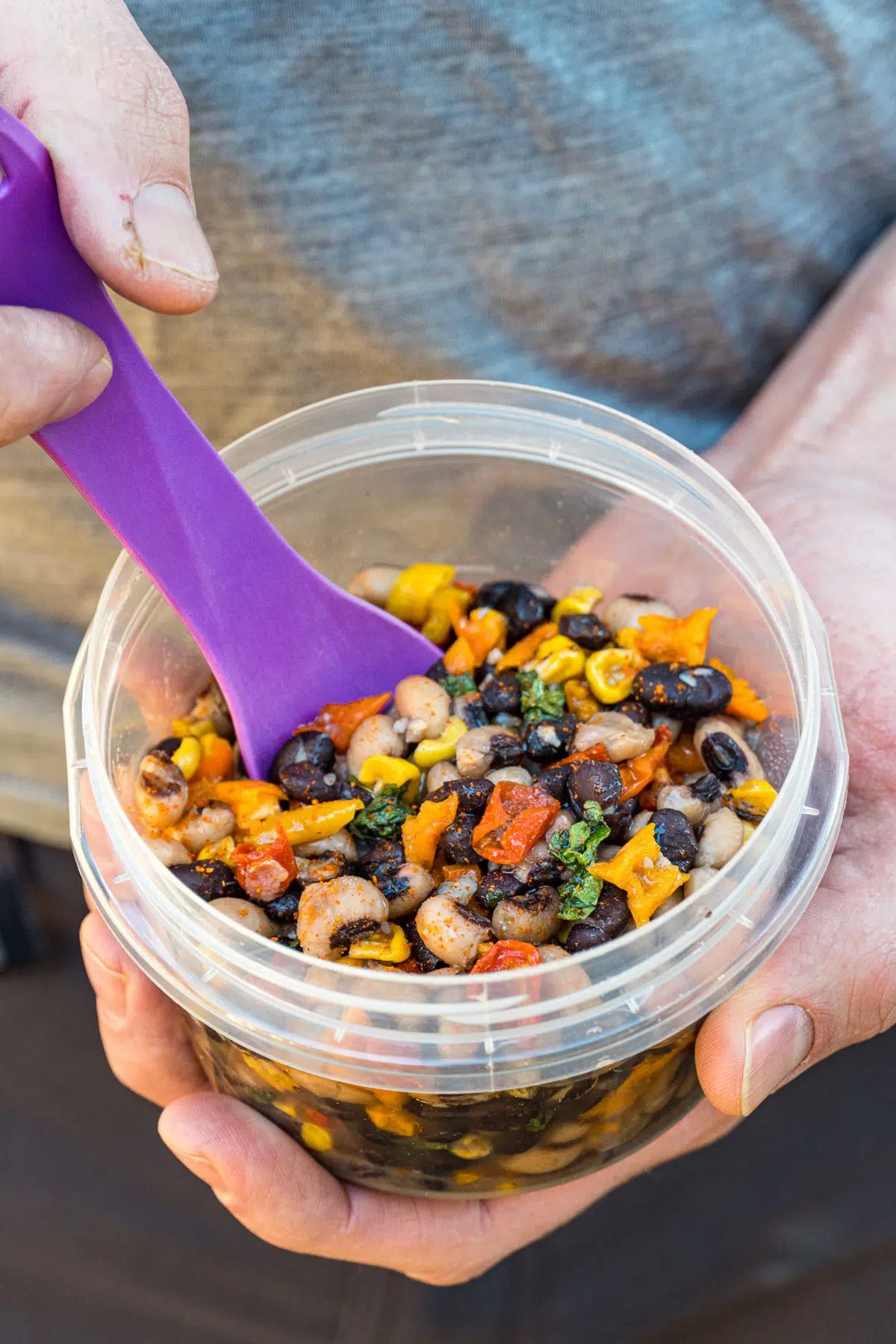 Michael holding a small bowl of cowboy caviar