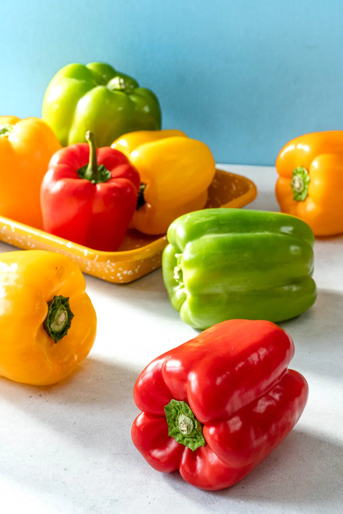 Red green yellow and orange bell peppers