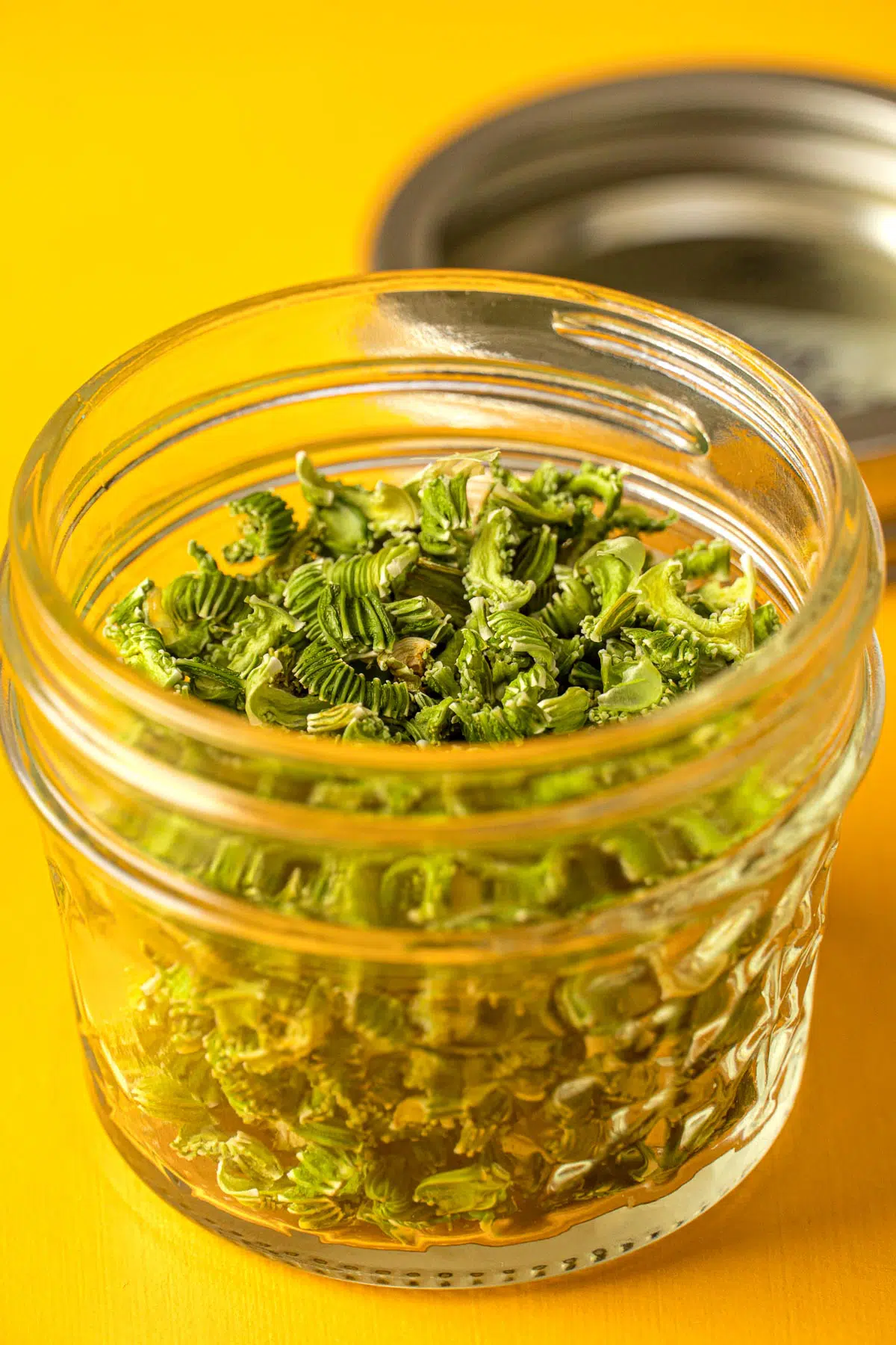 Dehydrated celery in a small jar