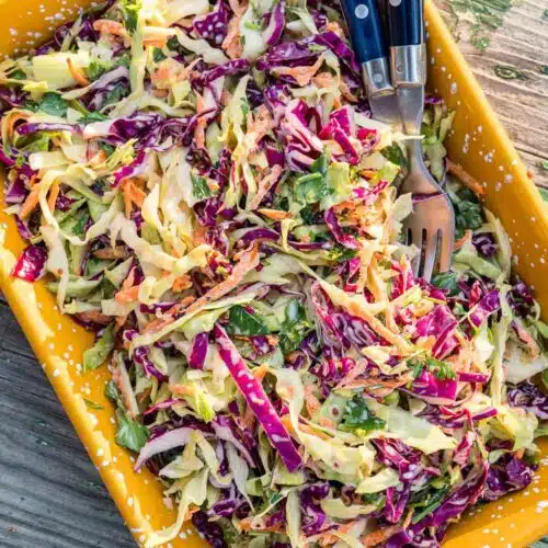 Coleslaw in a yellow dish.