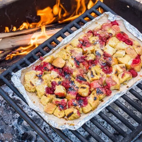 Foil packet french toast on a campfire grill