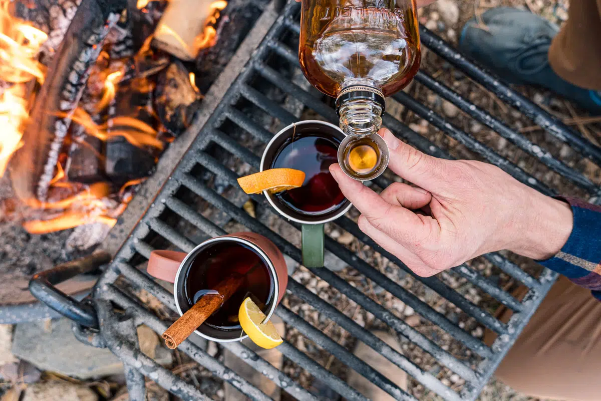 Pouring bourbon into a shot glass