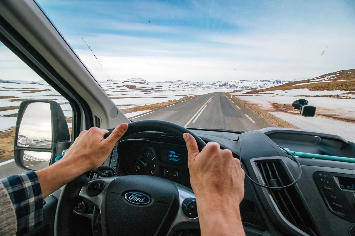 POV shot of driving a campervan on a road in Iceland