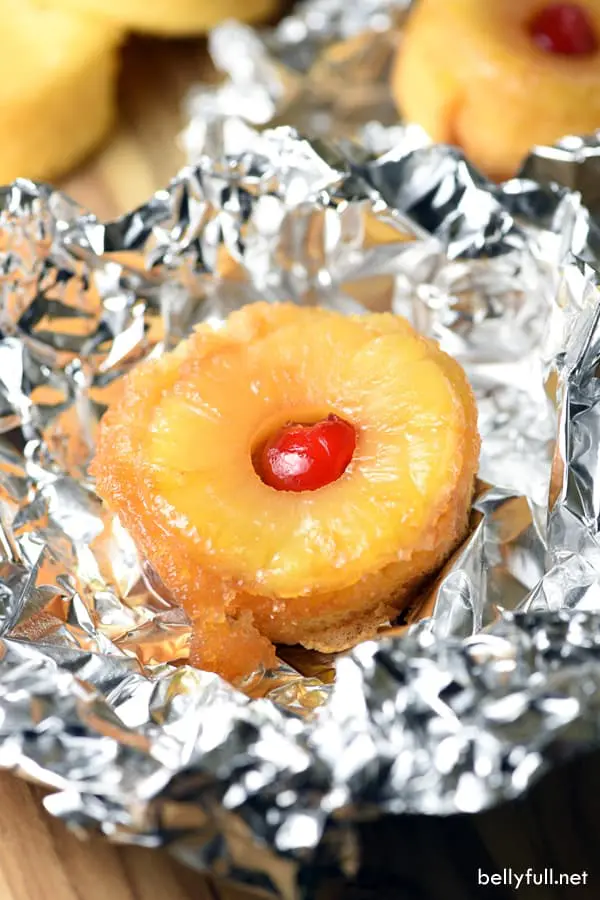 Individual pineapple upside down cake in foil