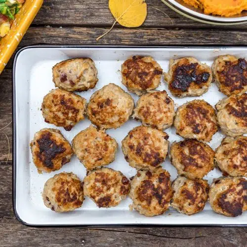 Turkey meatballs on a white enamel platter