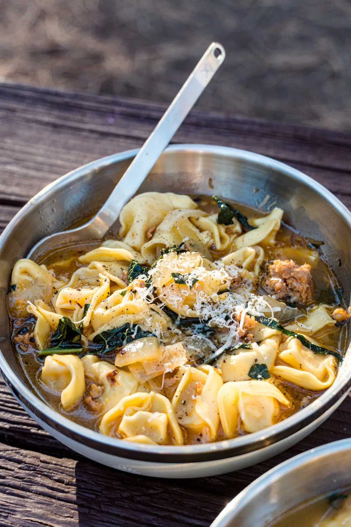 Tortellini soup in a bowl