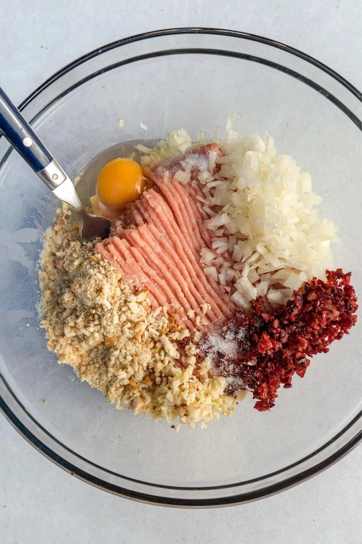 ingredients for thanksgiving meatballs in a bowl