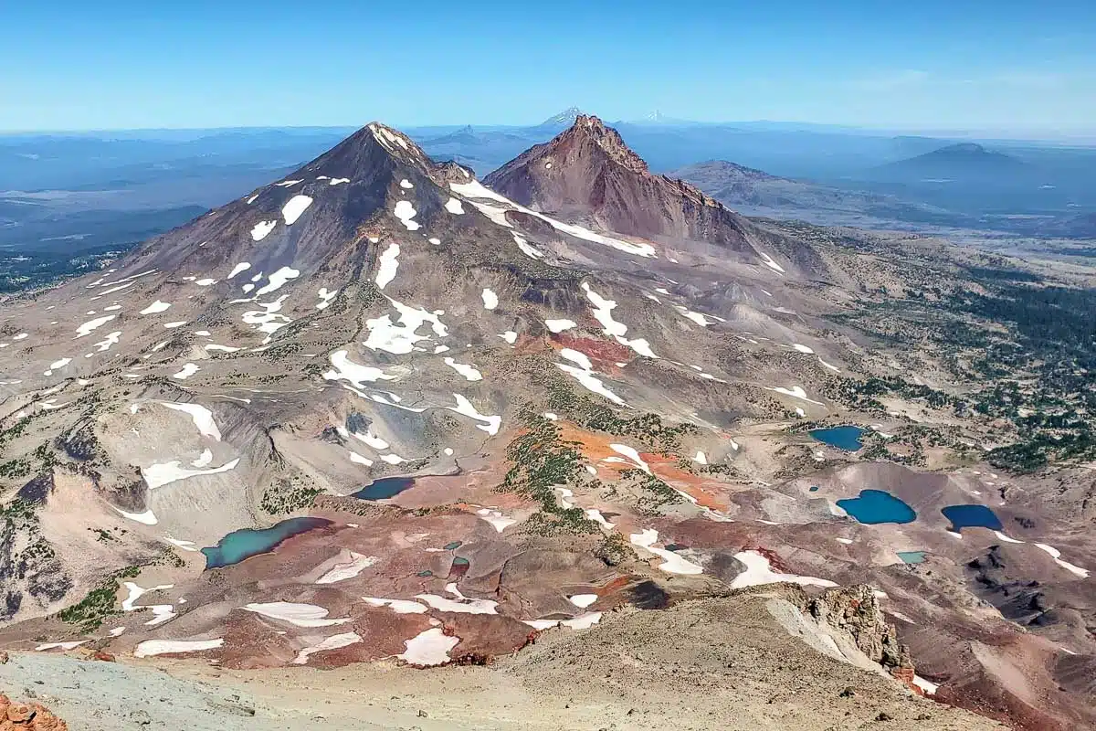 View of mountain peaks and lakes from the top of South Sister