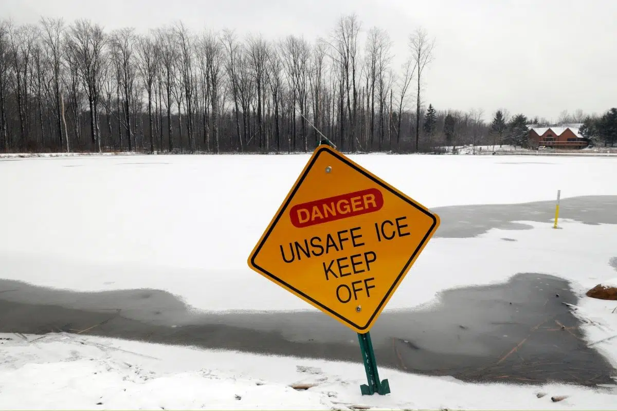 Yellow sign reading Danger Unsafe Ice Keep Off